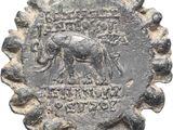a close up of a coin with a horse on it