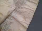 a close up of a piece of cloth with a lace on it