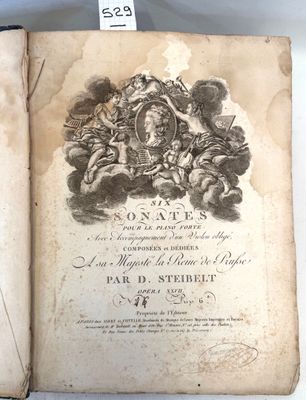 an old book with a picture of a man riding on a horse