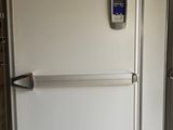 two refrigerators that are in the kitchen next to each other