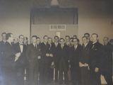 an old photo of a group of men in suits