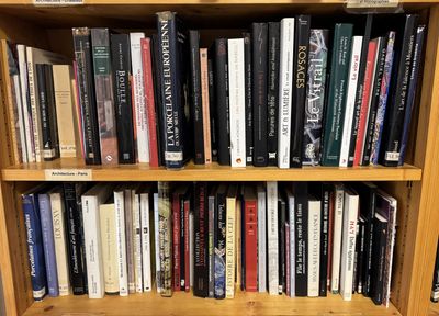 a book shelf with many books on it