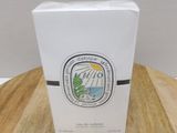 a white box on a wooden table with a logo on it