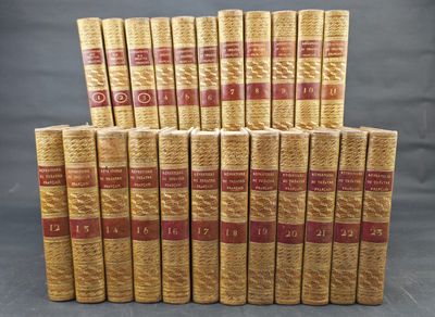 a stack of old books sitting on top of each other