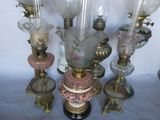 a lot of glass vases that are sitting on a table