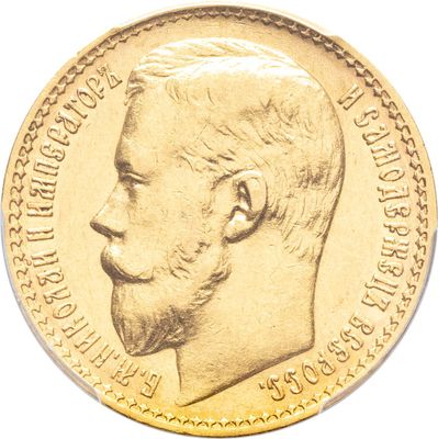 l'image d'une pièce d'or sur laquelle figure le visage d'un homme