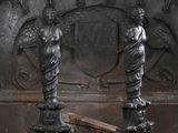 two statues that are standing next to each other