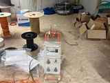 a room that has a lot of wires and wires on the floor