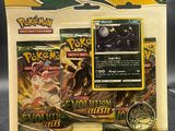 gros plan d'une boîte de cartes pokemon sur une table