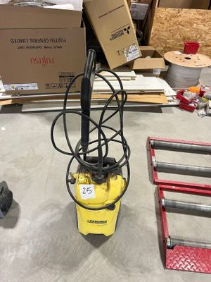 a yellow machine that is sitting on the floor