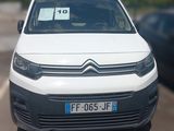 a white van that is parked in a parking lot