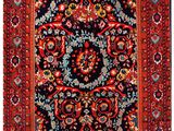 un tapis rouge et bleu à motifs de médaillons