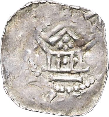 an old silver coin with a bird in a cage on top of it