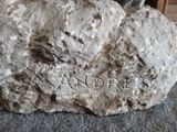 a rock that has been carved into the side of a building