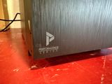 a close up of a metal box on a red surface