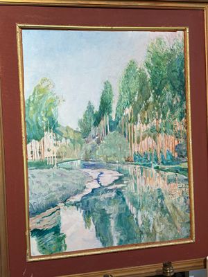 une photo d'un tableau représentant une rivière, dans un cadre
