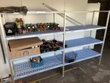 a shelf with bottles and cans on it in a garage