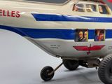 a toy airplane with pictures on the side of it