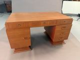 an image of a wooden desk with drawers and drawers on it