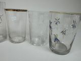 three glasses sitting next to each other on a table