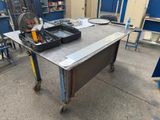 a table that has a lot of tools on it