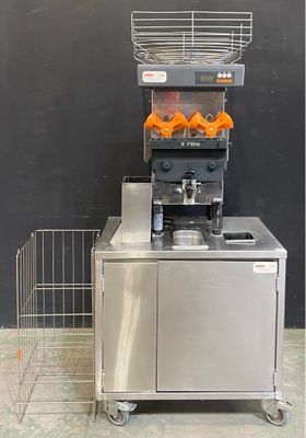 a machine that has orange juices in it