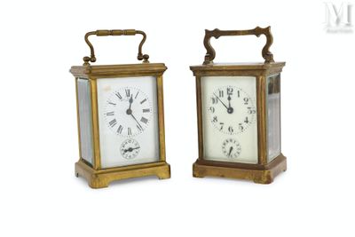 pair of antique brass carriage clocks with roman numerals