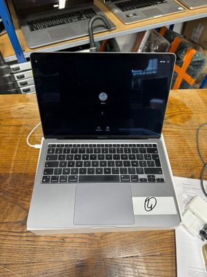 a laptop that is sitting on a table in a room