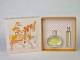 an image of a box with a bottle of perfume inside of it