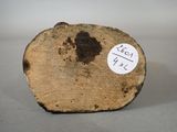 a piece of wood that has a sticker on it