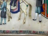 a painting on the wall of a building with a man riding a horse