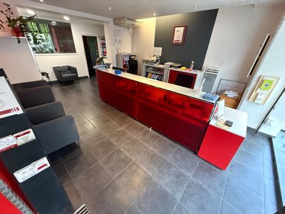 a red counter in the middle of a large room