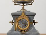 a clock that is sitting on top of a table