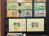 framed picture of a collection of stamps and stamps from different countries