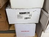 several boxes stacked on top of each other in a room