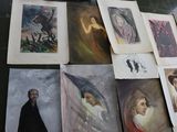 many pictures of people on the wall of a room
