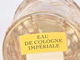 a glass jar with a label on it that says eau de cologne imperiale