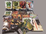 a lot of comic books on the table together
