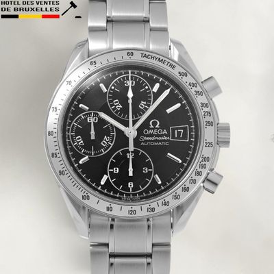 an image of a close up of a watch on a white surface