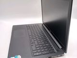 a laptop that is sitting on a white table