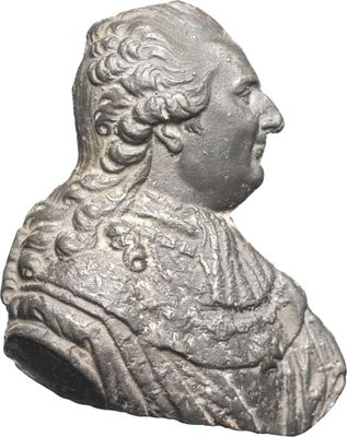 a close up of a statue of a man with a beard