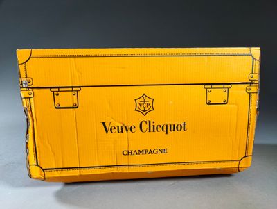 an open box of champagne sitting on top of a table