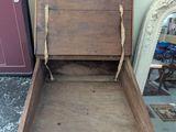 a wooden box that is sitting on the floor