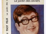 un livre sur lequel figure la photo d'un homme portant des lunettes et un nœud papillon
