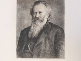 portrait d'un homme à la longue barbe, en costume-cravate