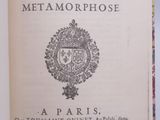 a book with a picture of a coat of arms on it
