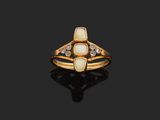 an oplite and diamond ring