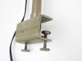 a picture of a metal object on a white wall