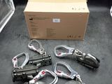 a lot of clamps that are sitting on the floor