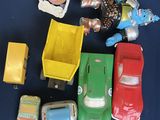 a lot of toy cars that are sitting on a table